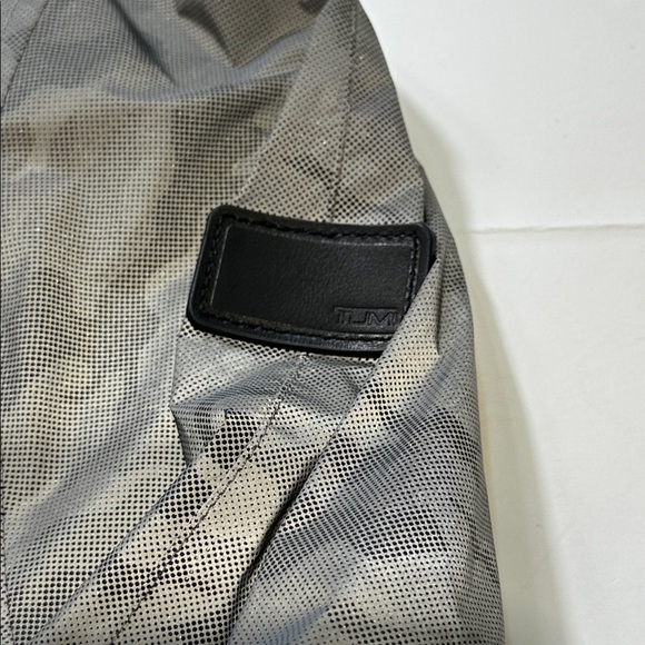 TUMI Men's Camo Reflective Packable Rain Jacket - Picture 3 of 13